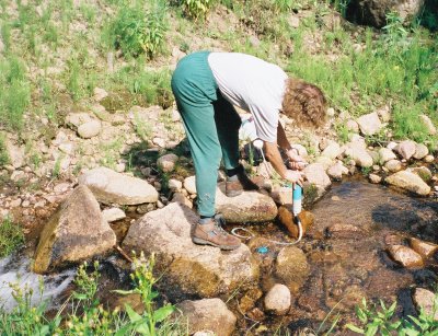 Terry is filtering some water.