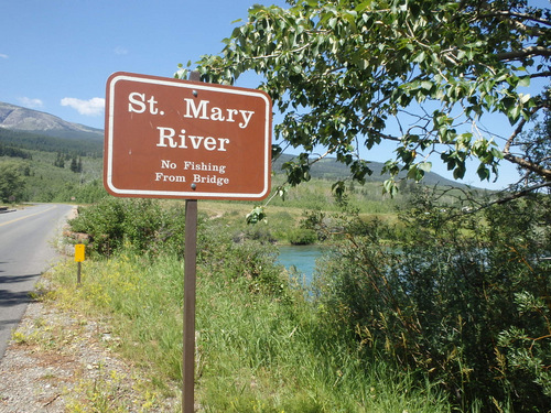 The sign and bridge over St Mary River.