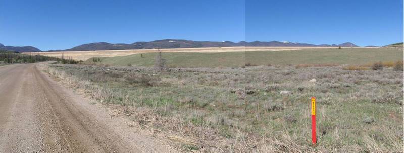 Huge mine tailing pile disguised as a dam.