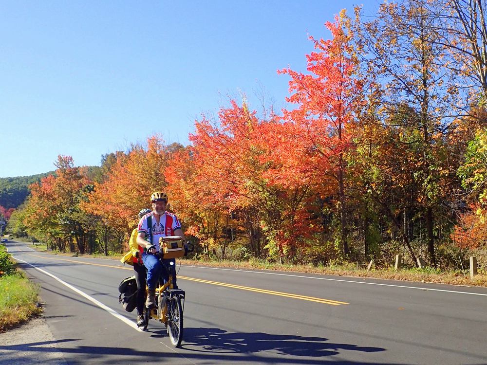 Dennis & Terry Struck and the Bee cycling cross-country in the Fall Foliage of Massachusetts.