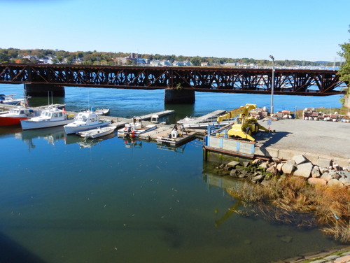 Merrimack River boat docks viewed from the bridge on US-1 in Newburyport, MA.