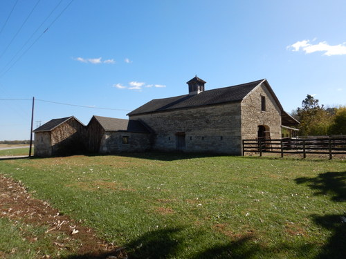 Native Stone Barn and Outbuildings.