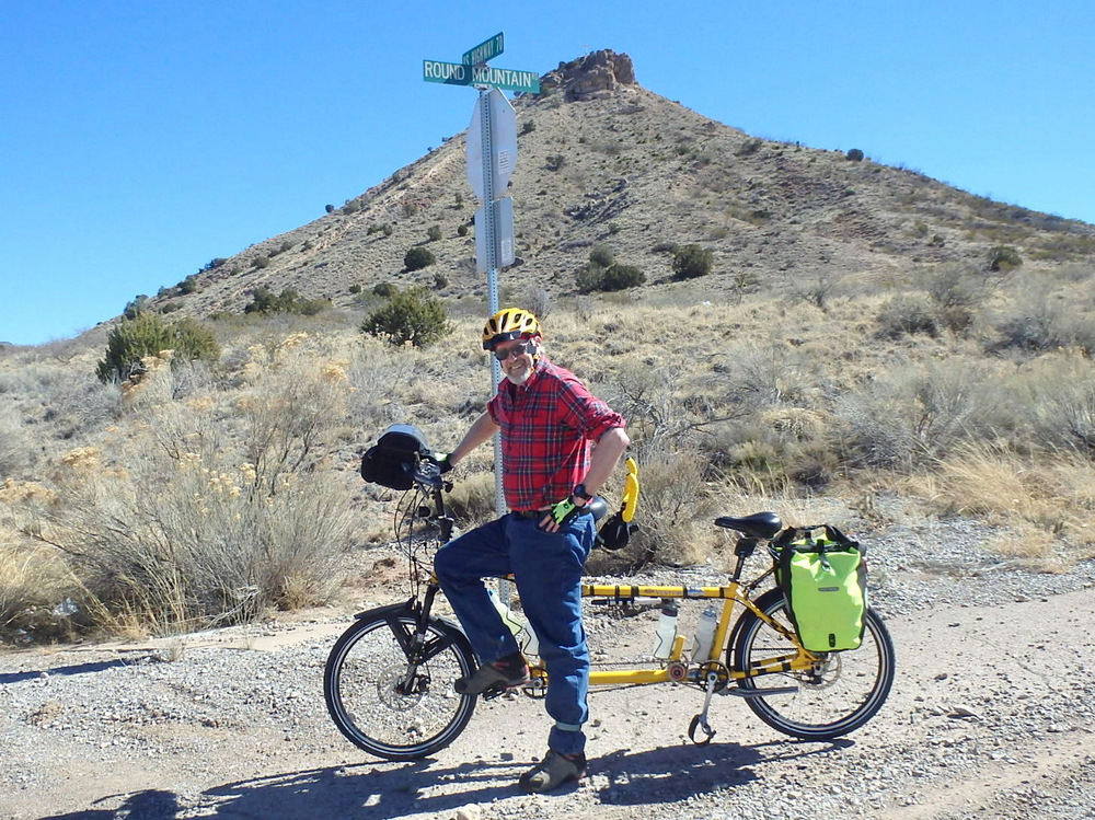 Dennis and the Bee at the base of Round Mountain, a Tularosa New Mexico landmark.