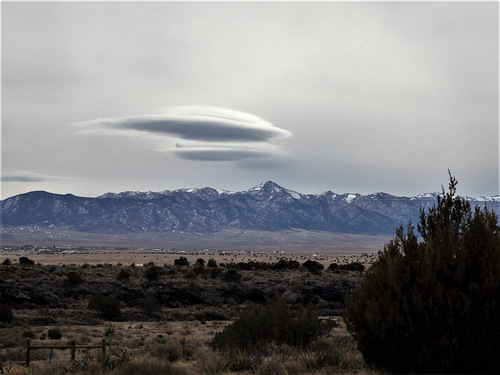 Looking ESE across the Sacramento Mountains (unknowingly capturing a pair of Lenticular Clouds, interestly over Roswell).