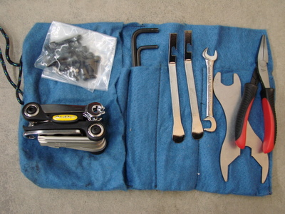 Multi-Tool; Spare Bolts, Nuts, Washers; 
Headset Wrench, other Tools