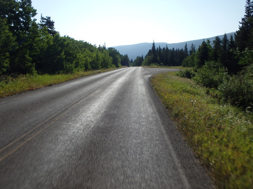 Cycling out of Many Glaciers Lodge, Glacier NP.