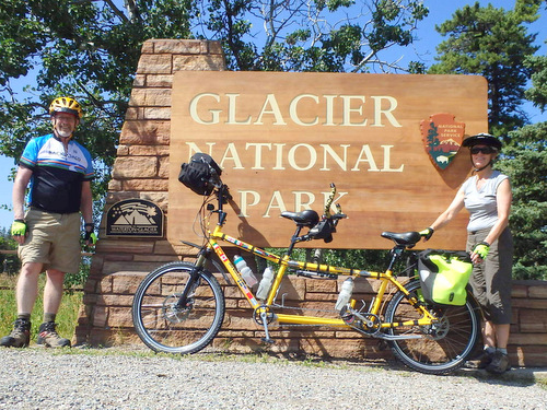 Dennis, Terry, and the Bee pose at the Northeast Entrance of  Glacier National Park, Montana. I think that we were about 4 miles from the Canadian Border.