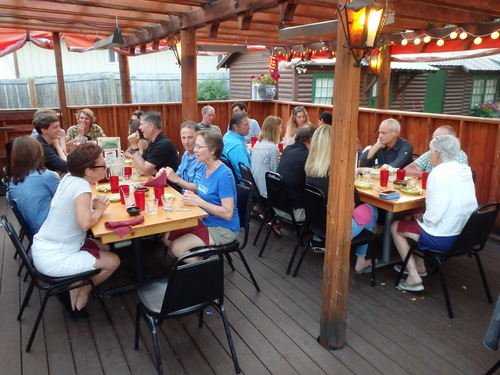 Community Dinner in the open on a warm August evening.