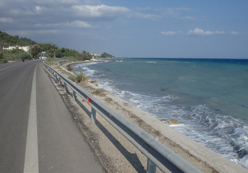 Cycling the Gulf of Corinth's coast.