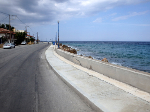 Cycling the Gulf of Corinth's coast.