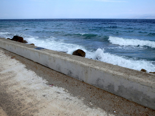 Cycling the Gulf of Corinth's coast.