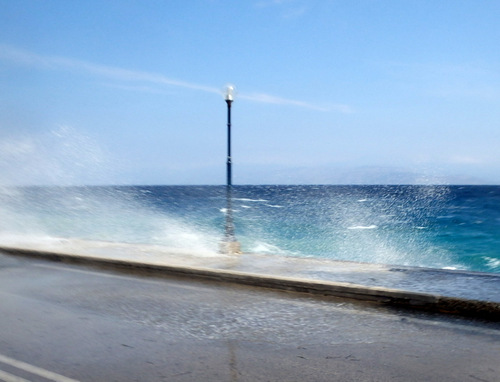 Cycling the Gulf of Corinth's coast.