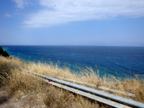 Cycling the Gulf of Corinth's coast.