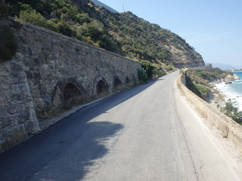 Cycling the Gulf of Corinth's coast.