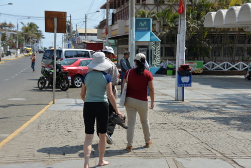 We are walking along the Huanchaco town's beach front.