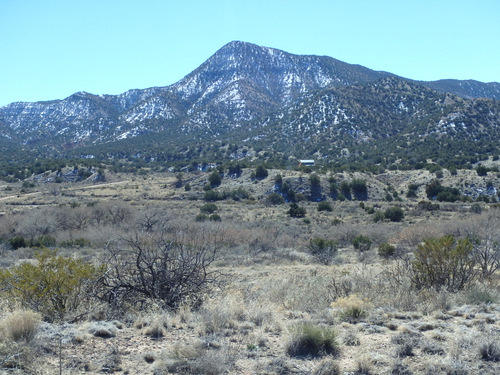 Climbing eastward, looking southeast, we were getting closer to the snowline.